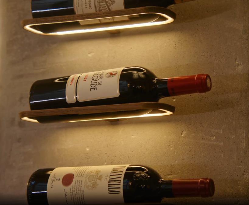 Bottles on illuminated cradles